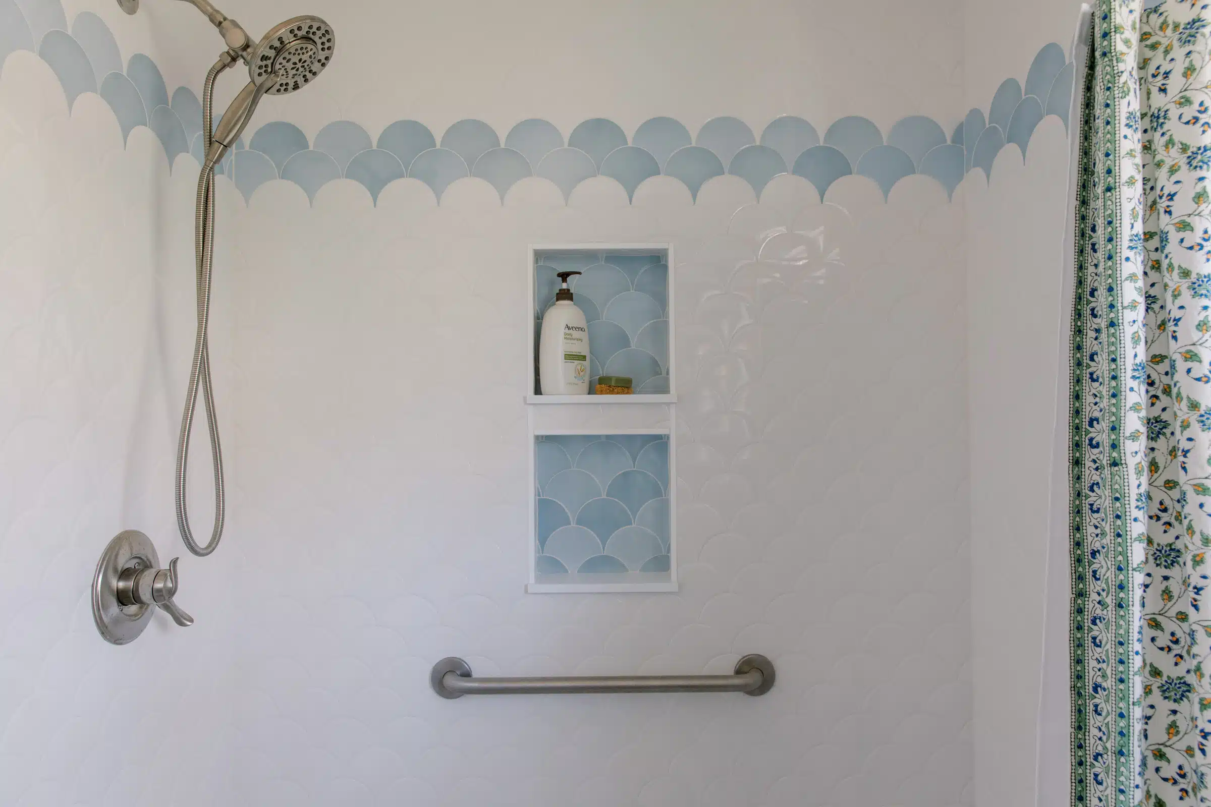Tub to shower conversion with Fish scale tiles in blue and white