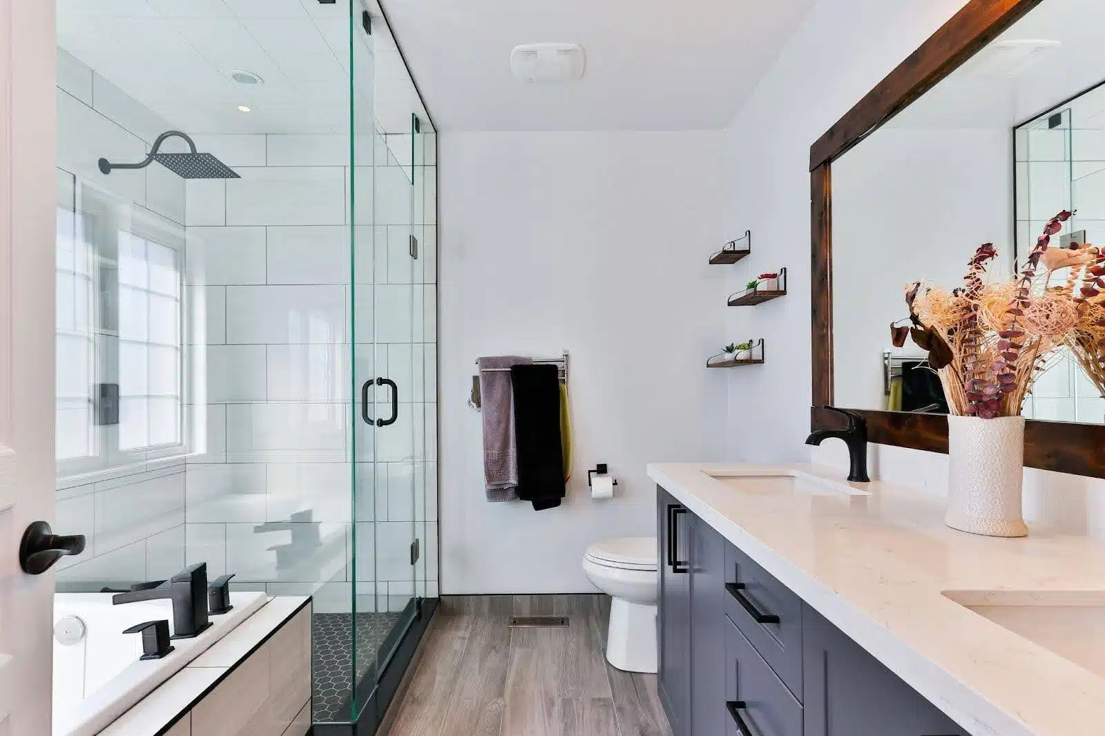 A clean, remodeled bathroom with a walk-in shower